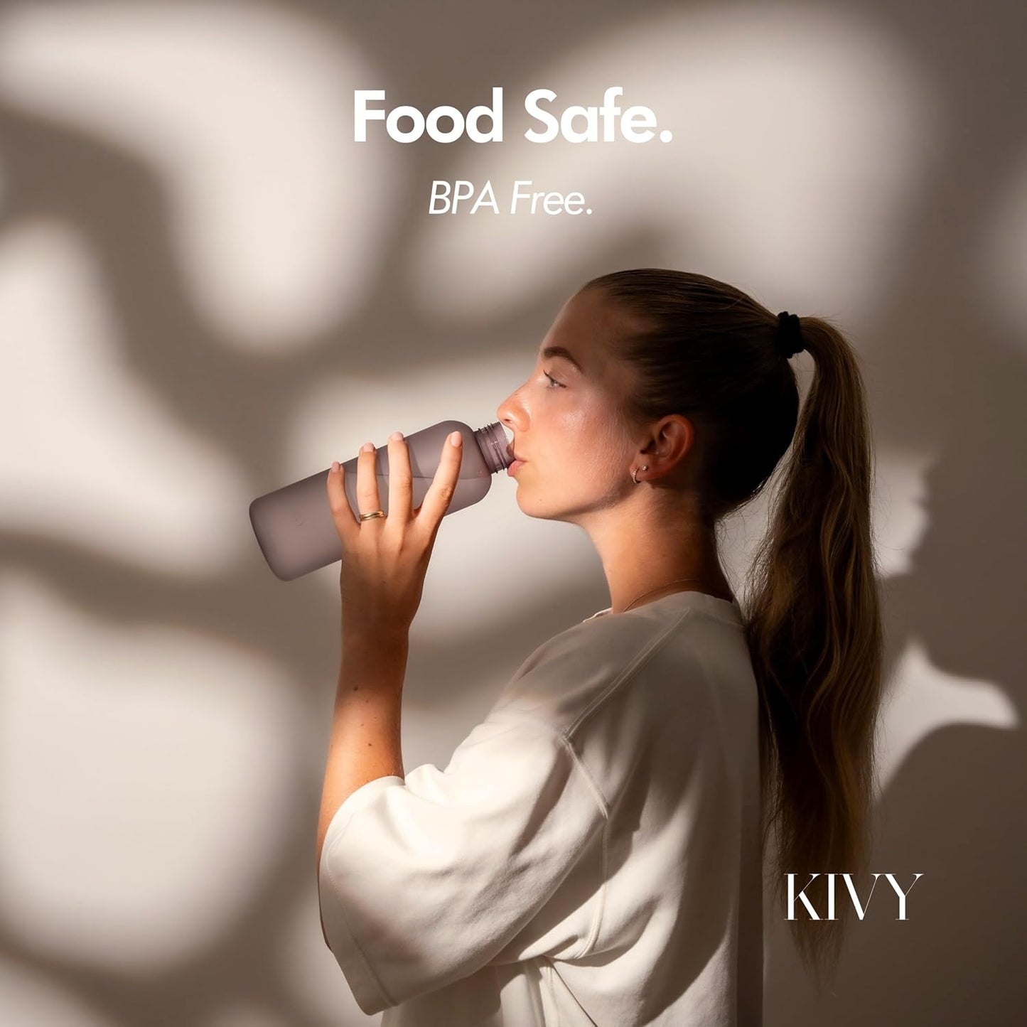 KIVY Tritan Water Bottle with removable sleeve - 22 oz Water Bottle screw top - Reusable water bottle no straw - Aesthetic water bottle - Black bottle for men - Dishwasher safe